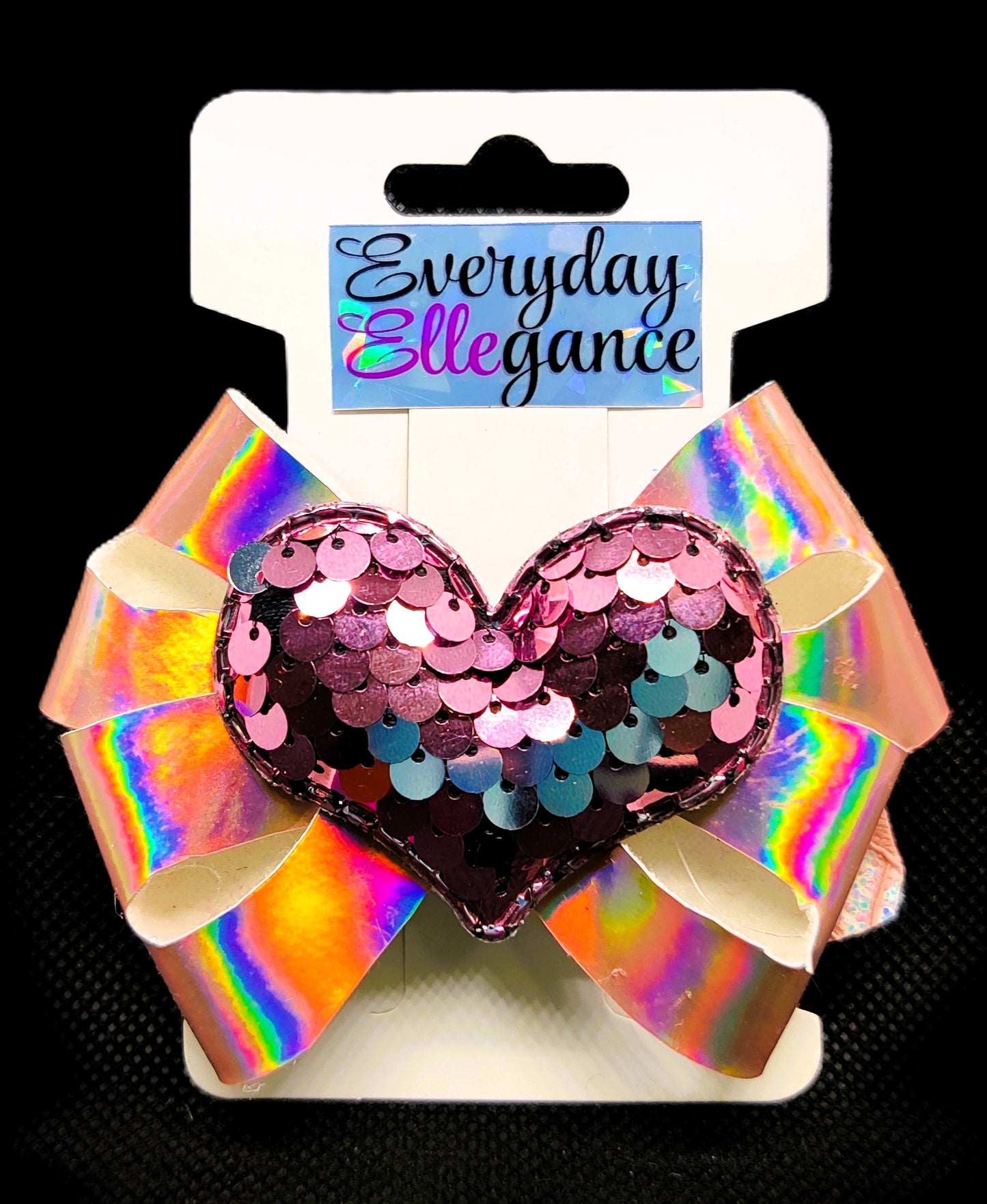 Holographic Pinwheel Bow with Sequin Heart Accent