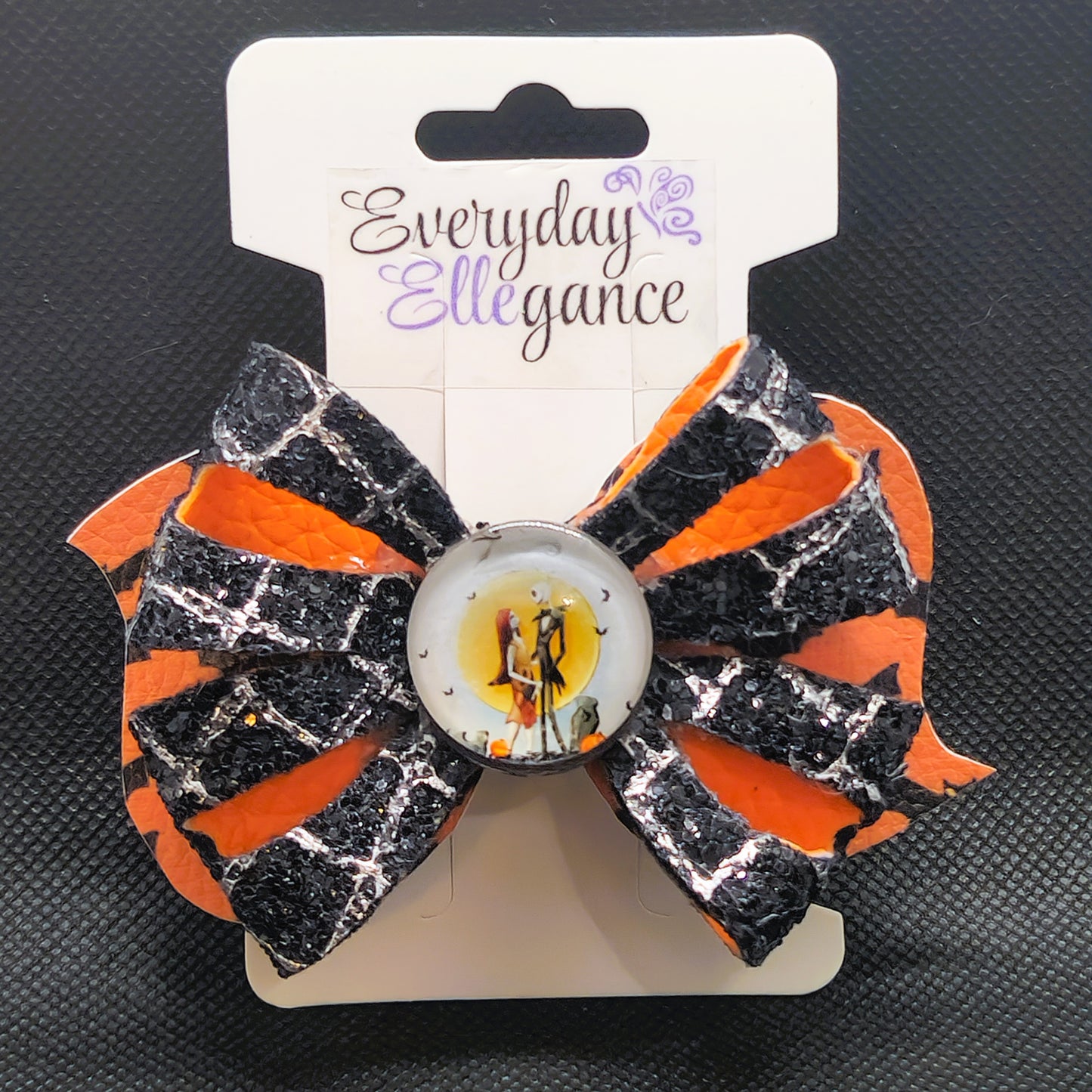 Jack and Sally Pinwheel Glitter Bow with a Jack and Sally Cabochon Accent