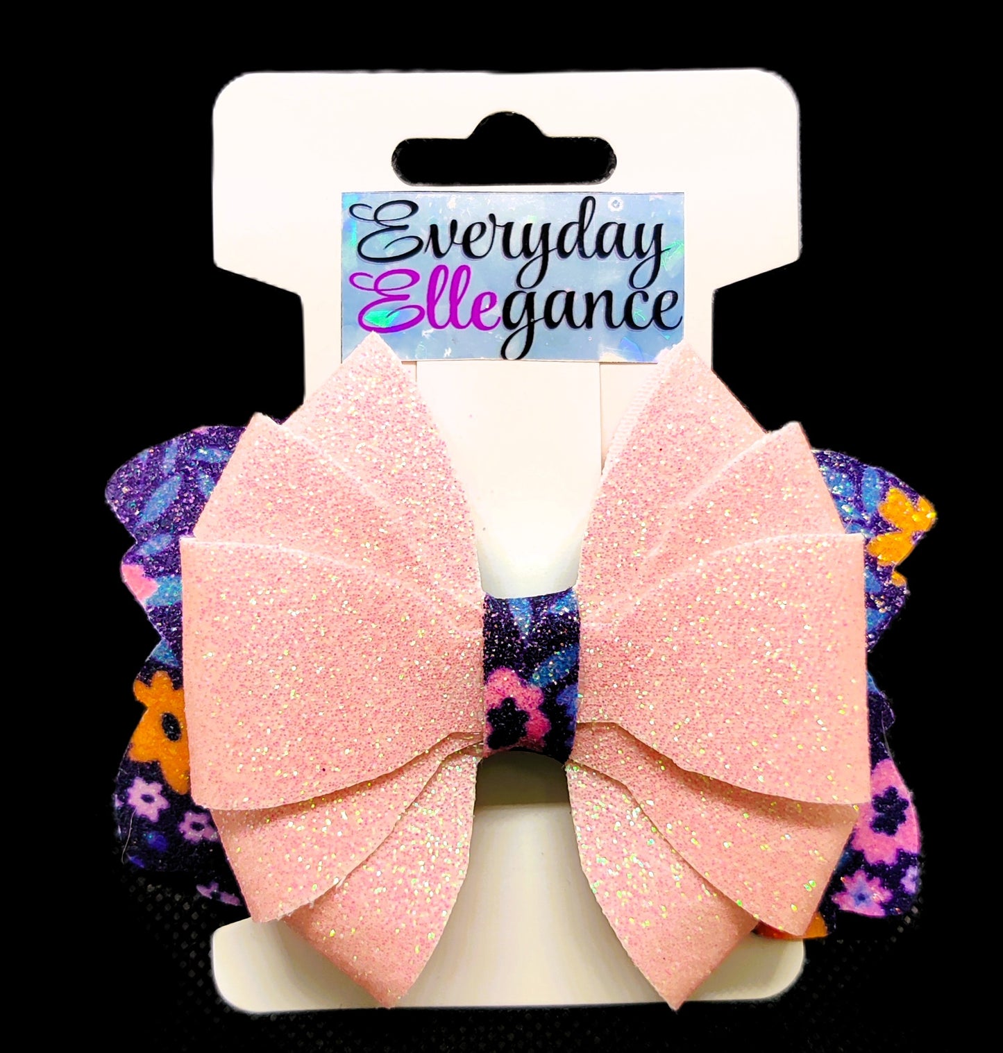 Glitter Pinwheel Bow with a Glitter Floral Background