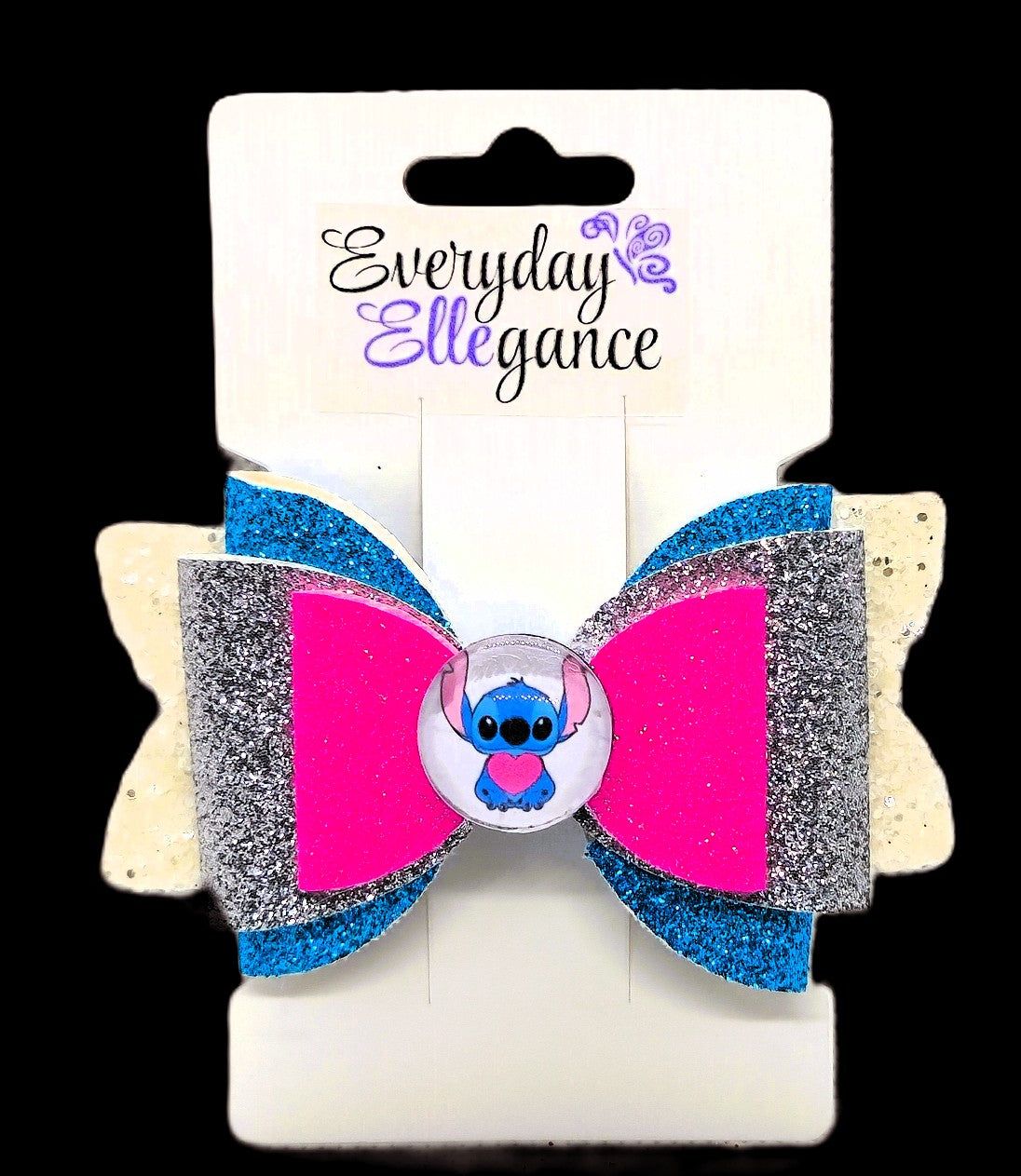 Glitter Bow with a Stitch Cabochon Accent