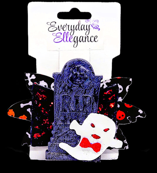 Glitter Cut Out Bow with a Ghost and Tombstone Accent