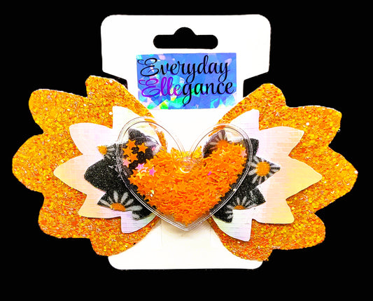 Glitter Daisy Print Bow with a Heart Shaker Accent